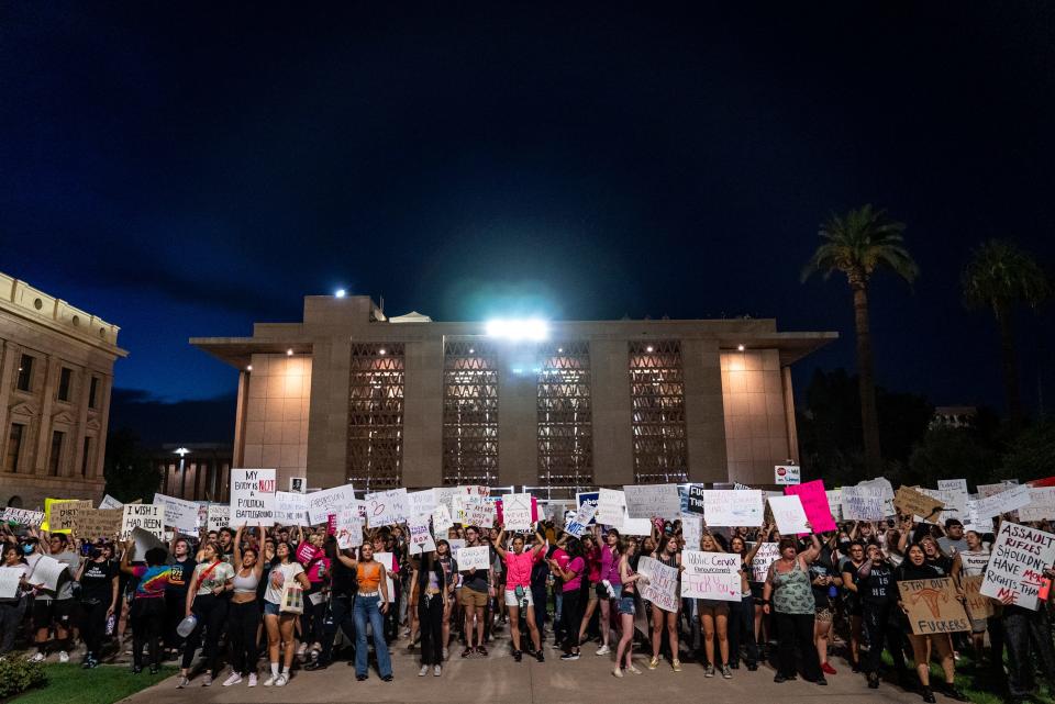 Abortion-rights activists protest outside the Arizona State Senate following the Supreme Court's decision to overturn Roe v. Wade, in Phoenix on June 24, 2022.